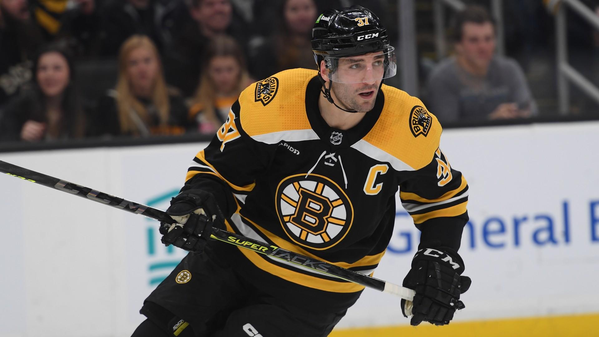Patrice Bergeron assiste à un match des Bruins et la machine à rumeurs s’emballe